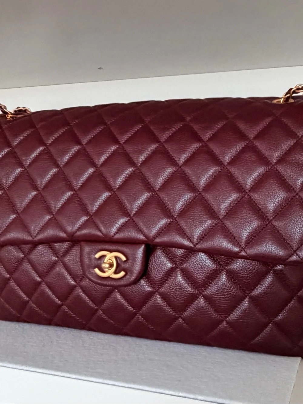 CHANEL Grained Calfskin Quilted XXL Travel Flap Bag in Burgundy Gold Hardware